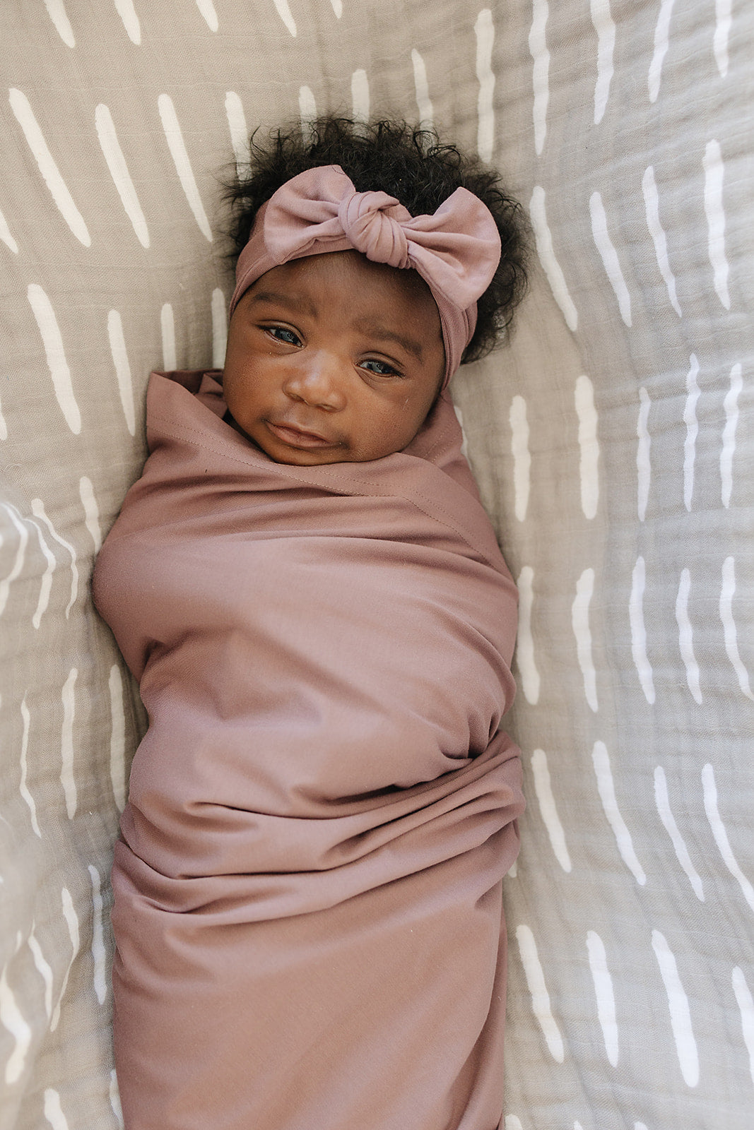 Mebie Baby Bamboo Stretch Swaddle. Gender Neutral for take home outfits and swaddling newborns.