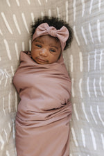 Mebie Baby Bamboo Stretch Swaddle. Gender Neutral for take home outfits and swaddling newborns.
