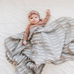 Mebie Baby Grey Dash Muslin Quilt. Mebie Baby Gender Neutral Infant Muslin quilt its 100% cotton. Looks great in any nursery.