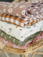 Mebie Baby Gender Neutral Infant Muslin quilt its 100% cotton. Looks great in any nursery.
