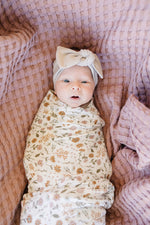 Mebie Baby Gender Neutral Infant Muslin Swaddle its 100% cotton.