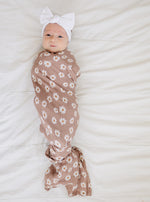 Mebie Baby Gender Neutral Infant Muslin Swaddle its 100% cotton.