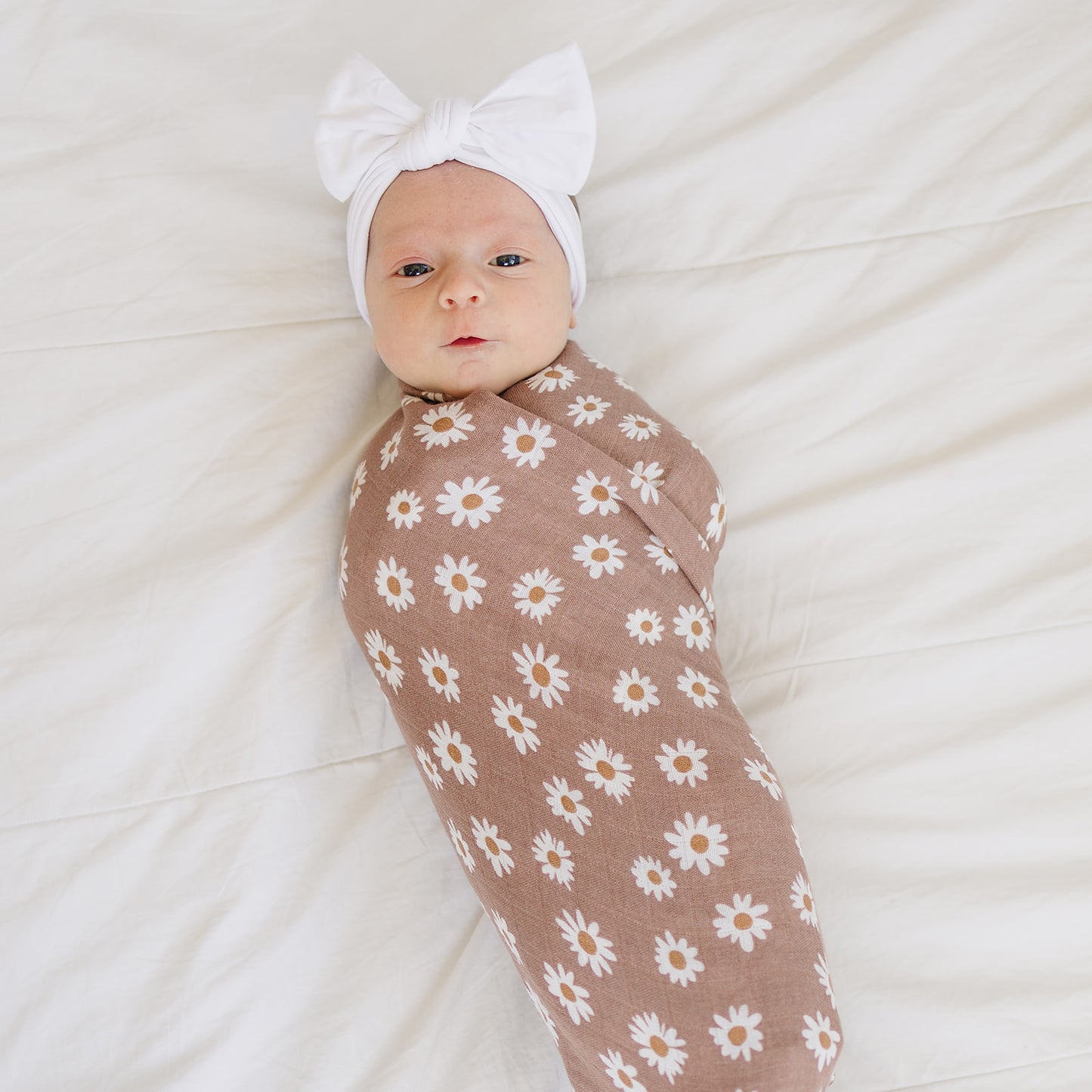 Mebie Baby Gender Neutral Infant Muslin Swaddle its 100% cotton.
